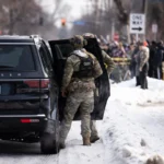 Federal officer wears BORTAC vest in Minneapolis