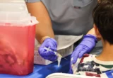 Federal Health Officials Outline Major Overhaul to Childhood Vaccine Schedule, Signaling Potential Shift Toward Staggered Doses