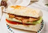 Beyond the Basic: Elevating the Pork Chop Sandwich with the Art of Apple Slaw