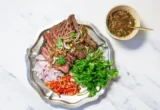 The Art of the Grill: Mastering Thai-Style Steak with Nam Jim Jaew