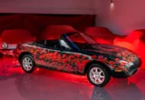 A Rolling Tribute: Mazda and Mission Motorsport Unveil Third Poppy Art Car