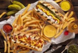 The All-American Pilgrimage: 12 Legendary Hot Dog Joints from "Diners, Drive-Ins and Dives"
